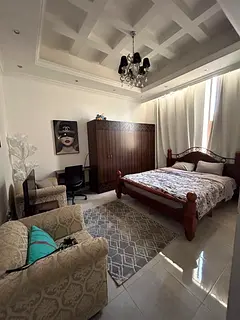Master bedroom with private bathroom in a villa center Dubai