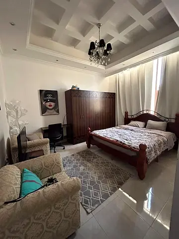 Master bedroom with private bathroom in a villa center Dubai