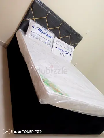 King size bed frame with mattress topper