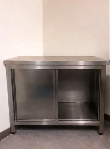 Steel shelf with doors . Big space inside 100×70
