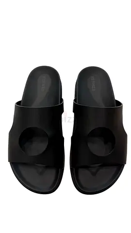 Hermès Edith Cut-out Leather Sandals in black calfskin.