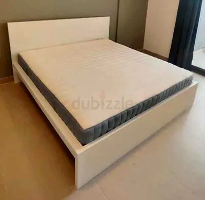 IKEA malam king‑size bed (180 × 200 cm) with an IKEA mattress