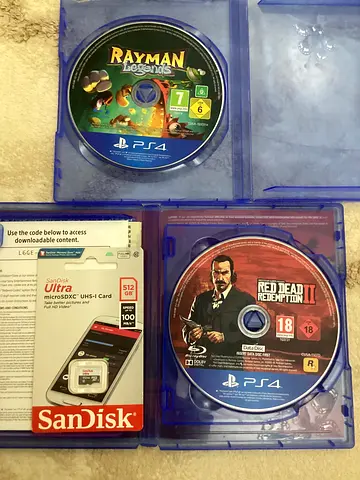 شريط RDR2 PS4 بحالة ممتازة، قرصين، شغال 100 ريد ديد و راي مان و ميموري كارد   RDR2 PS4 game disc in