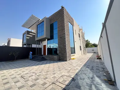 Modern design brand new 5 Badroom villa with maid room in Al hoshi area price 190k