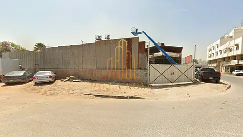 Industrial land in a prime corner location on two streets - includes a fence and warehouse - ideal location - high income