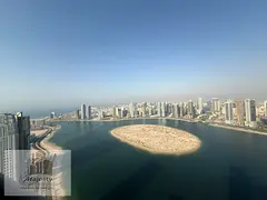 For sale: an apartment with a fully open front view of the Corniche of the lake in the Emirate of Sh