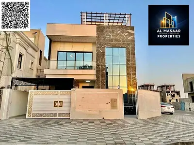 Corner villa, price inclusive of registration and ownership fees, on the main street, ready to move in, in one of Ajman's most prestigious areas, free
