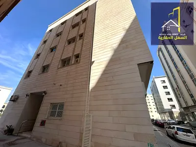 لبيع بناية بمنطقة القليعة امارة الشارقة موقع ممتاز