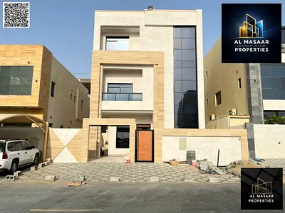 Three-story villa + roof for sale in Al Yasmeen (Al Maidan) - Ajman | 7 master bedrooms | Central air conditioning | Spacious rooftop terrace