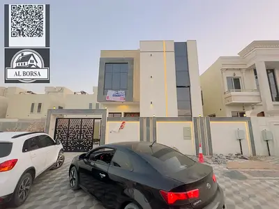 فرصة رائعة للإيجار فيلا واسعة ومميزة بتصميم عصري وتشطيبات حديثة، تقع في منطقة الحليو 2 – عجمان، مع ارتداد كبير أمام الفيلا لمواقف السيارات وحوش داخلي