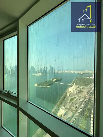 إطلالة بحرية ، شقة غرفتان ماستر + بلكونة + تكييف ومسبح وجيم ومواقف مجانية