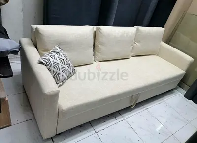 Stylish Beige Sofa with Cushions