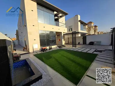 Luxury villa for sale in Ajman, Al Muwaihat 2. Super deluxe finishing. 🔥🔥 The villa is in an excellent location at the exit of Sheikh Ammar Street a