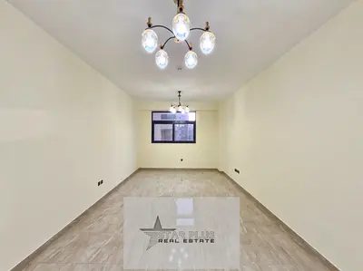 LIKE A BRAND NEW LUXURIOUS 2 BEDROOM WITH SPACIOUS CLOSED KITCHEN HAVING GYM,POOL AND COVERED PARKING.