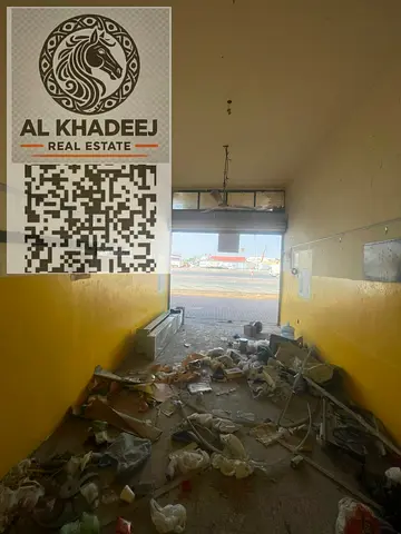 A prime commercial space for annual rent in Al Muwaihat 2, Ajman, with an area of ​​500 square feet.