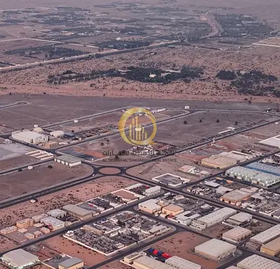 Land for sale in the UAE Industrial City, in an excellent location, Block (4), Scrap Area. With an area of 112,000 sq. ft.