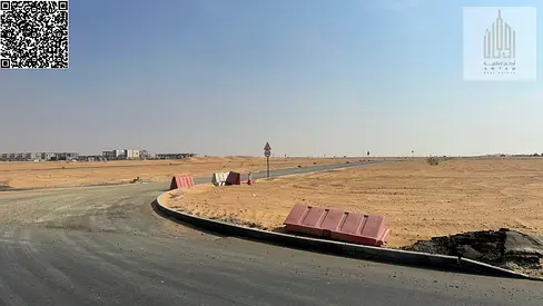 للبيع ارض سكني استثمارى بمشروع بساتين السره الارض علي بعد500متر من جامعه ام القيوين