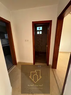 One-bedroom apartment with a living room in Al Aaliya, large space, 2 bathrooms, and a balcony, prim