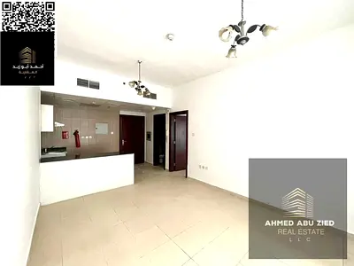 Most beautiful 1BR + Hall for annual rent in City Tower, Ajman, with balcony, 2 bathrooms, kitchen, central A/C, prime location and flexible payments.