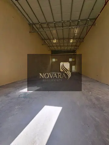 Warehouse for annual rent in Umm Al Thu’ub, Umm Al Quwain, area 2500 feet, electricity 38 kilowatts, practical location, rent 115 thousand annually.