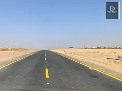 Residential land for sale in Sharjah, Al Tai area, east of Al Suyoh suburb,