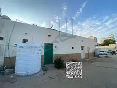 Arabian-style residential investment house for sale in Al Bustan area – Ajman, corner lot on two s