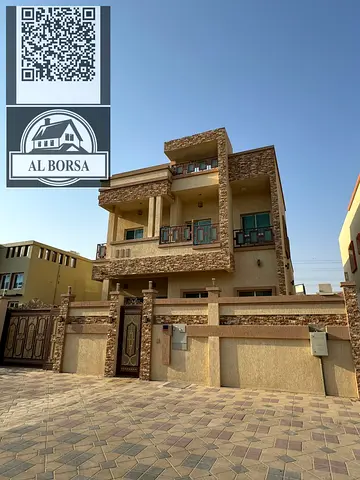 For rent a villa in Al Yasmeen, Ajman, 4 bedrooms, a majlis, a hall with a maid's room and a spacious kitchen