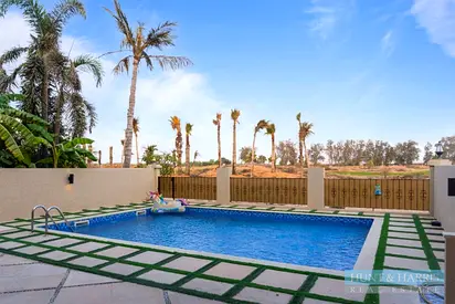 3 Bed Townhouse for Rent Al Hamra Village - Pool - Garage Door