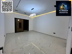 Luxury villa for sale in Al Muwaihat, Ajman, with a swimming pool, price includes electricity, water