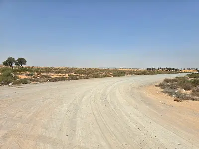 للبيع اراضى سكنية تاون هاوس بام القيوين على شارع الشيخ محمد بن زايد بجاور جامعة ام القيوين