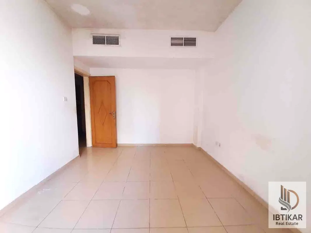 Chiller-Free 2-Bedroom Apartment with Balcony in Al Qasimia - AED 40,000