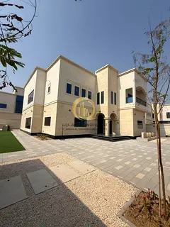 For sale: a new villa in Sharjah, Al Houshi area - Arab ownership. It features a modern and elegant
