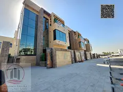 Villa for sale in Ajman, Al Helio area, including registration, electricity, and air conditioning. 6