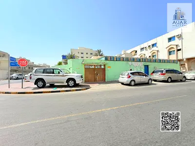 فيلا استثمارية زاوية في النعيمية | دخل سنوي 110 ألف | مساحة 6400 قدم | 12 غرفة