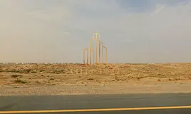 Commercial land - prime location - on Khor Fakkan Road - permit - G+P+3