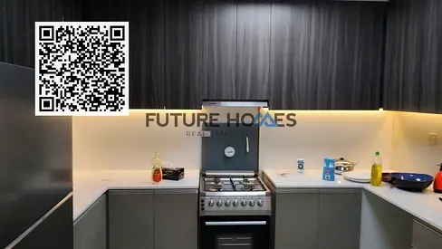 A furnished residential unit with one Bedroom, a Hall (living room), and a Kitchen with Parking in Gulfa Tower Ajman