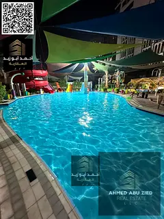 Elegant 2BHK in Al Rashidiya – luxury tower with gym, pool, aqua park, central A/C,