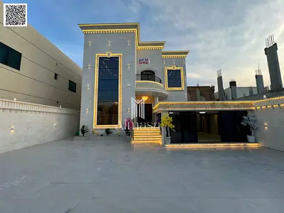 Villa for sale in Al Muwaihat in a prime location on a main street, residential and commercial, suitable for living or establishing a commercial proje