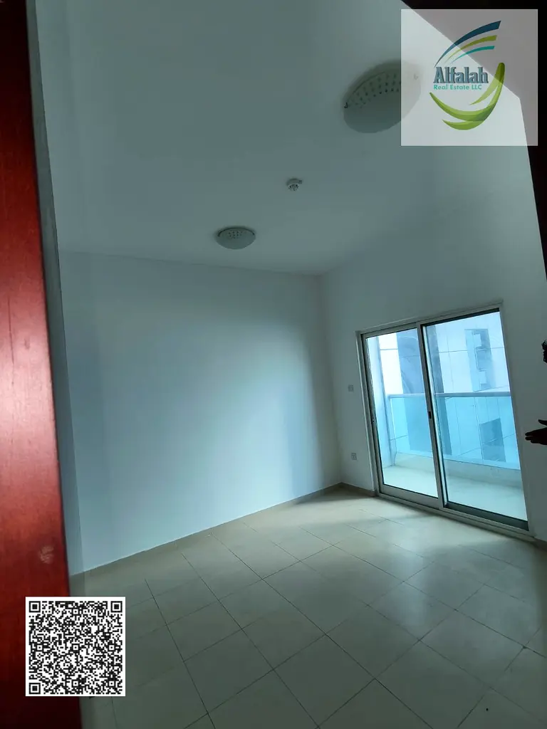 2 Bedrooms and hall for rent in City Towers Ajman with parking