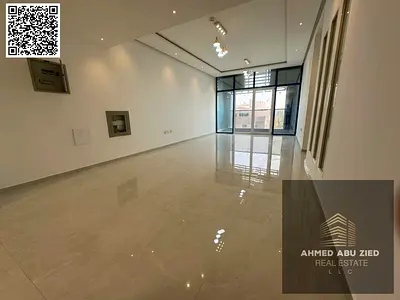 Free parking, built-in wardrobes, central air conditioning, balcony, open view, two bedrooms, living room, maid's room, spacious area, two bathrooms,