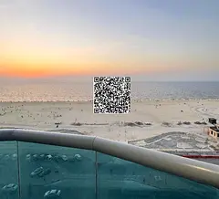 For sale: Two-bedroom apartment with a living room in Corniche Residence, including two parking spac