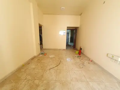 NO DEPOSIT CASH 1BHK WITH BALCONY ON ROAD BUILDING IN MUWAILEH