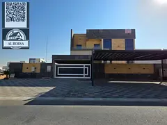 Modern villa for sale in Ajman, Al Helio area. 5 master bedrooms, 2 living rooms, majlis, kitchen, m
