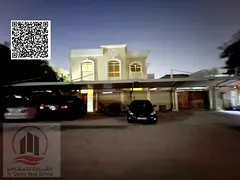 Villa for sale in Al Rawda 1, Ajman. Modern design. The villa features 9 master bedrooms, a majlis (