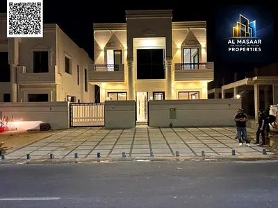 Villa with all registration, ownership, and electricity fees included, located on the main street, ready to move in, in one of Ajman's most prestigiou