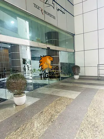 Apartment for sale in Al Taawun area overlooking the main street