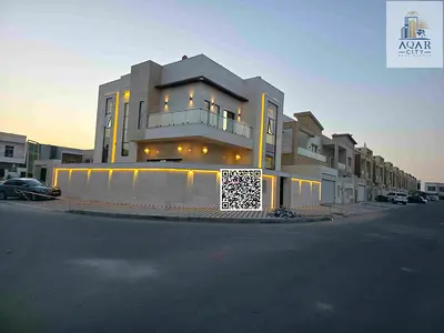 Luxury villa on the corner of two streets, including registration and ownership fees - two floors with an internal courtyard - opposite Rahmaniya, Sharjah - freehold for all nationalities - without an