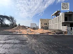 Townhouse plot for sale in Ajman, Al Helio 2 area, including registration fees. Residential villas.