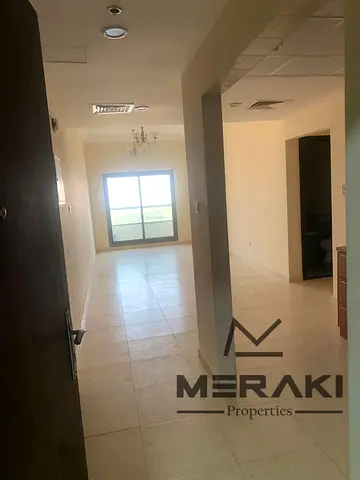 A one-bedroom apartment with a living room at a special price, also featuring an open view of Mohammed Bin Zayed, and it also with a private parking