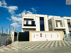 Villa for sale in Al Zahia area, Ajman. Elegant design, prime location. 5 master bedrooms, majlis, a
